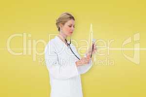 Composite image of blonde doctor listening with stethoscope