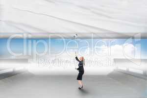 Composite image of businesswoman pulling a white screen
