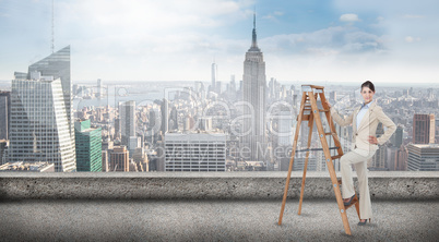 Composite image of smiling businesswoman climbing the career lad