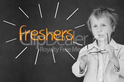 Freshers against schoolboy and blackboard