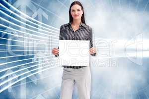 Composite image of businesswoman showing card