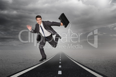 Composite image of smiling businessman in a hurry