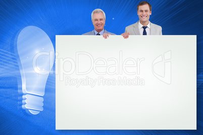 Composite image of businessmen showing card