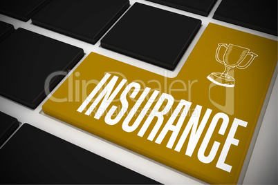 Insurance on black keyboard with yellow key