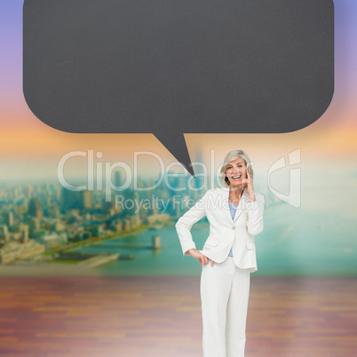 Composite image of thinking businesswoman with speech bubble