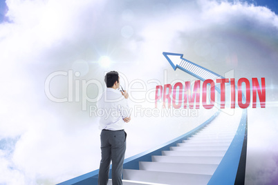 Promotion against red staircase arrow pointing up against sky