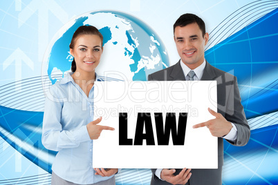 Business partners holding card saying law