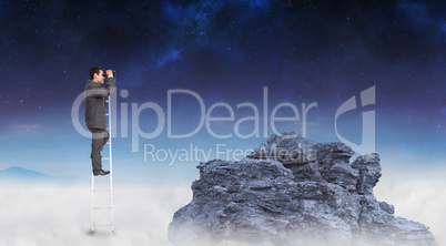 Composite image of businessman standing on ladder