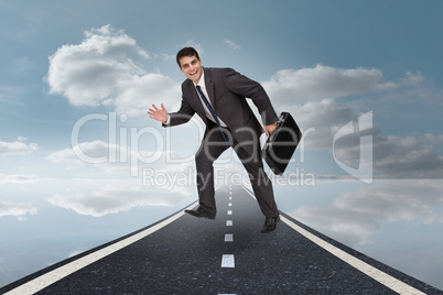 Composite image of cheerful businessman in a hurry