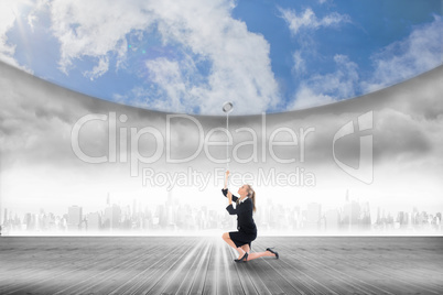 Composite image of businesswoman pulling down blue sky