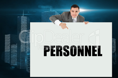 Businessman showing card saying personnel