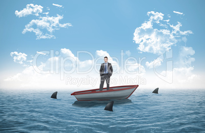 Composite image of thinking businessman in a sailboat
