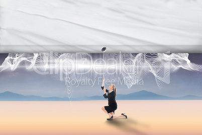 Composite image of businesswoman pulling a white screen