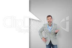 Composite image of stylish man smiling and gesturing with speech