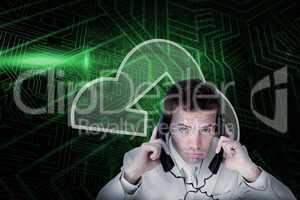 Composite image of cloud computing and businessman tangled in wi