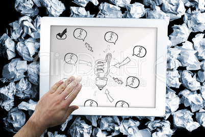 Composite image of hand touching tablet Composite image of hand touching tablet