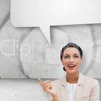 Composite image of smiling businesswoman holding a pen