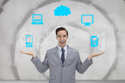 Composite image of smiling businessman presenting graphics with