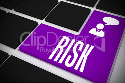 Risk on black keyboard with purple key