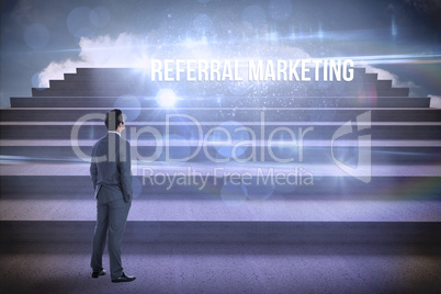 Referral marketing against steps against blue sky