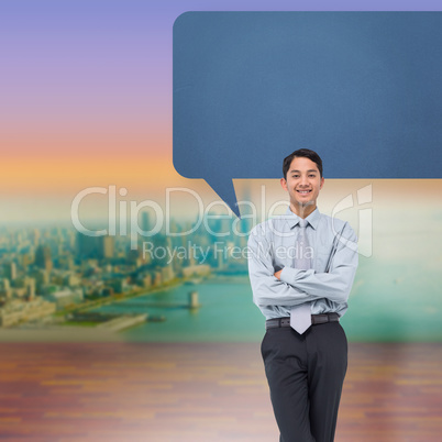 Composite image of smiling asian businessman with speech bubble