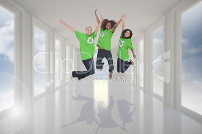 Composite image of enviromental activists jumping and smiling