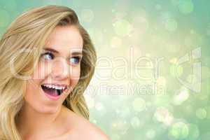 Composite image of smiling blonde natural beauty