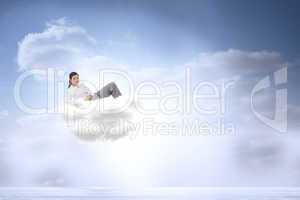 Composite image of relaxed businesswoman lying