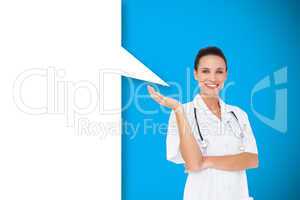Composite image of pretty nurse presenting with speech bubble