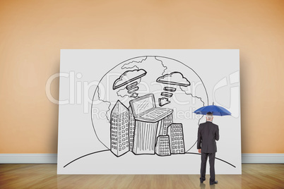 Composite image of businessman holding umbrella