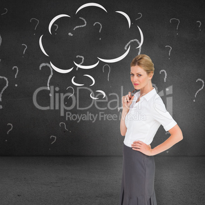 Composite image of thinking businesswoman