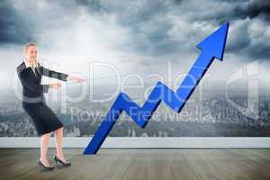 Composite image of businesswoman pulling a rope around arrow