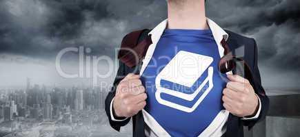 Composite image of businessman opening his shirt superhero style