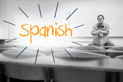 Spanish against lecturer sitting in lecture hall