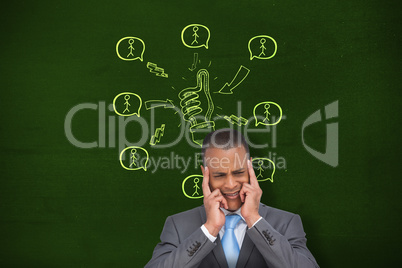 Composite image of stressed businessman putting his fingers on h