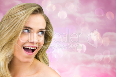 Composite image of smiling blonde natural beauty