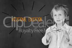 Vocational education against schoolboy and blackboard