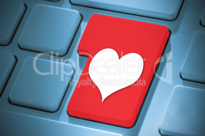 Composite image of heart on enter key