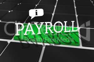 Payroll against black keyboard with green key