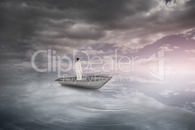 Composite image of asian businesswoman in a sailboat