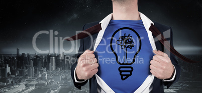 Composite image of businessman opening his shirt superhero style