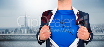 Composite image of businessman opening his shirt superhero style