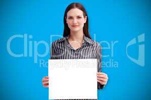 Composite image of businesswoman showing card