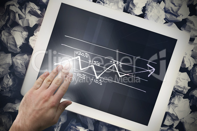 Composite image of hand touching tablet