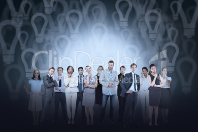 Business team against light bulb background