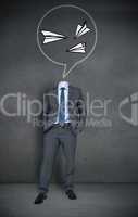Headless businessman with paper airplanes in speech bubble
