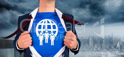 Composite image of businessman opening his shirt superhero style