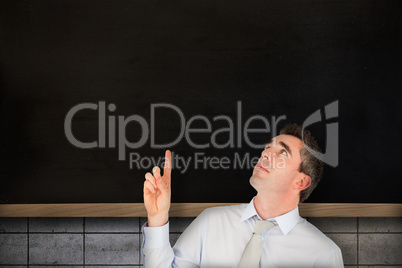 Composite image of business manager pointing