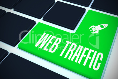 Web traffic on black keyboard with green key