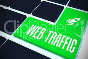 Web traffic on black keyboard with green key
